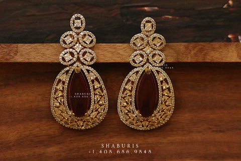 Diamond jhumka,big jhumka,swarovski,south sea pearl earring,party wear earrings,designer jewelry,hand picked jewelry,celebrity jewelry