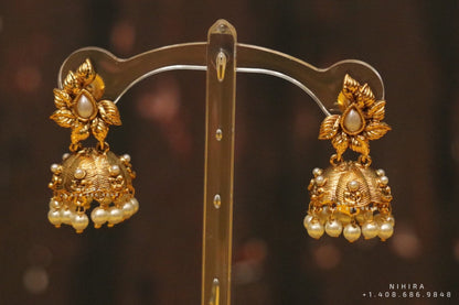 Diamond jhumka,big jhumka,swarovski,south sea pearl earring,party wear earrings,designer jewelry,hand picked jewelry,celebrity jewelry