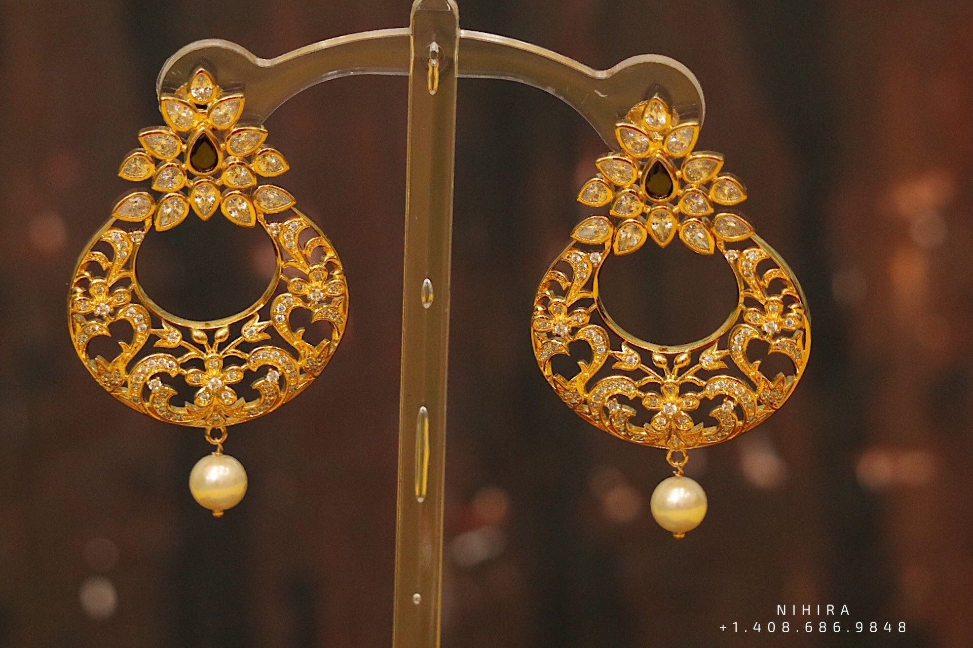 Diamond jhumka,big jhumka,swarovski,south sea pearl earring,party wear earrings,designer jewelry,hand picked jewelry,celebrity jewelry