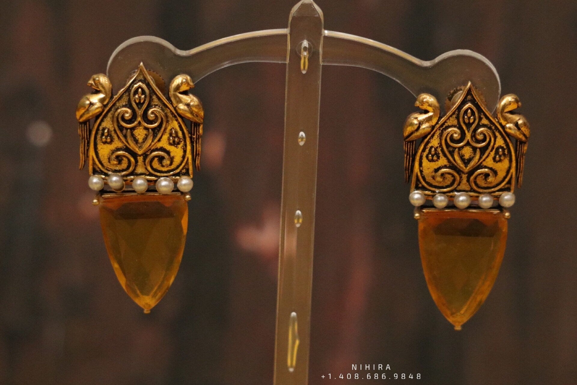 Chandelier earrings ,party wear earrings,designer jewelry,hand picked jewelry,celebrity jewelry,fashion jewelry,fusion jewelry earrings